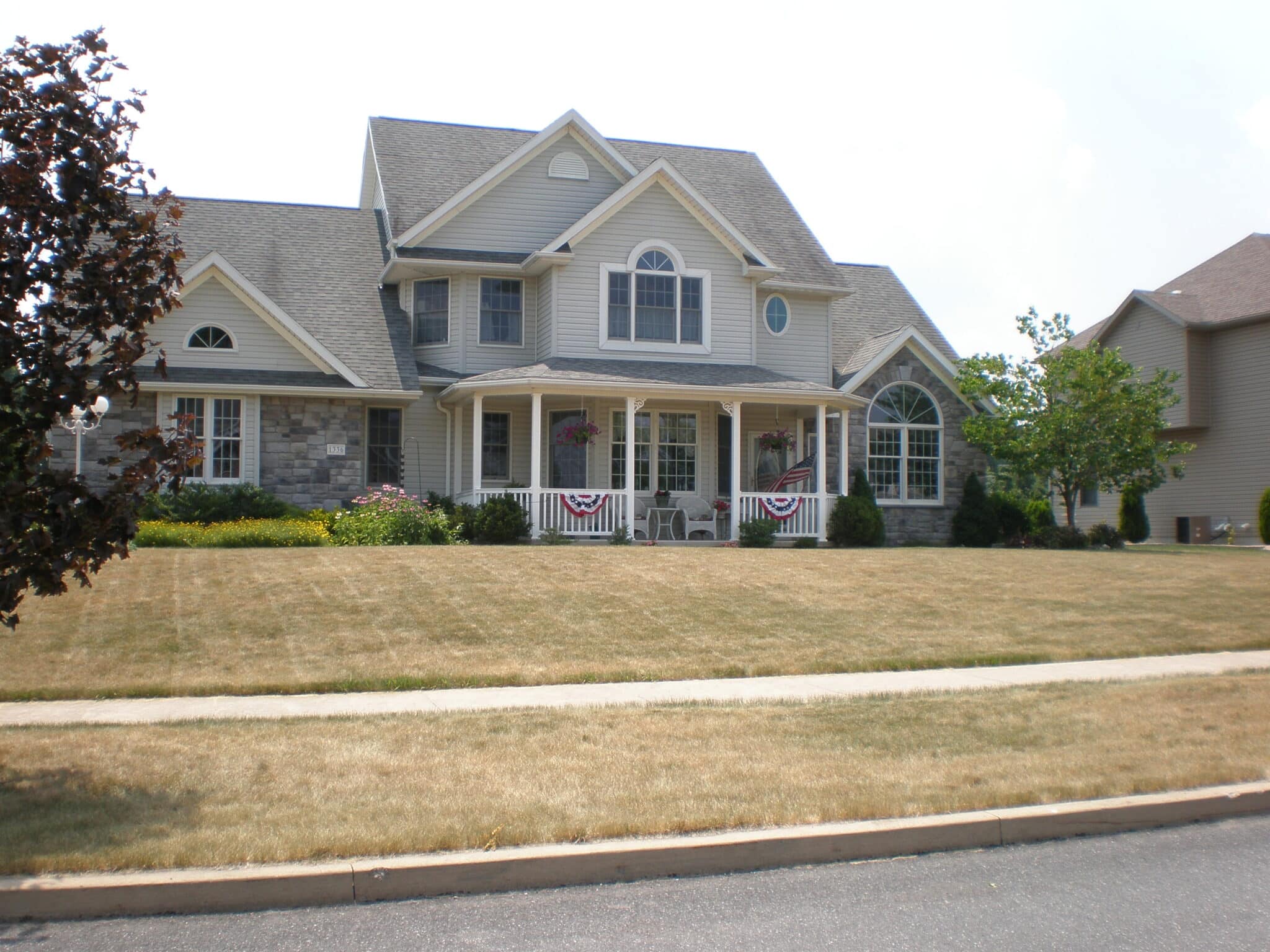 Summer-dormant lawn during a hot, dry period in summer.